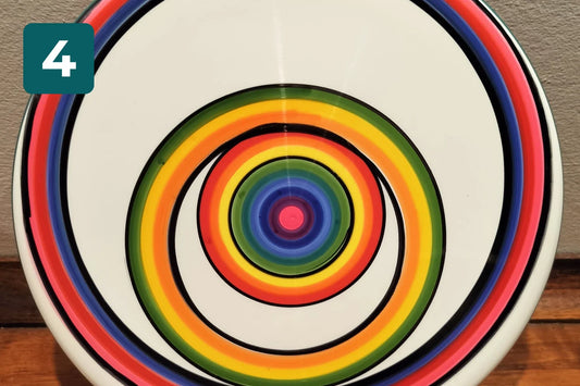 Disc with colored rings made with the spin dye method